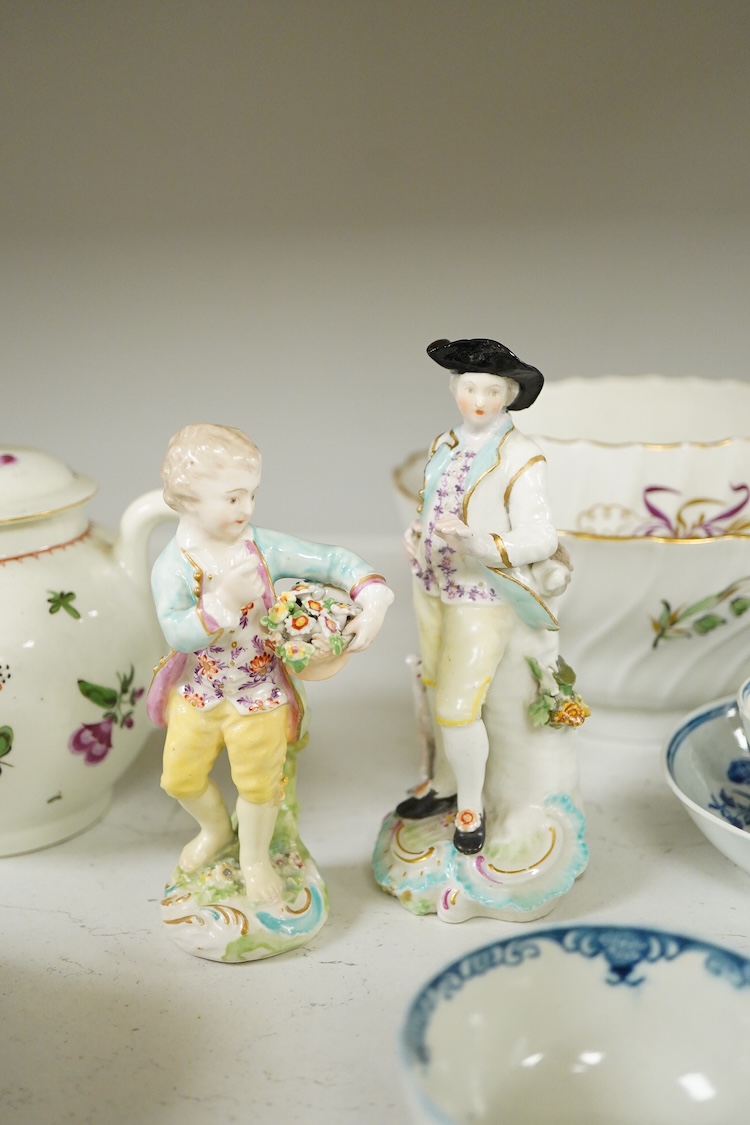 18th century mixed Worcester etc, including blue and white tableware together with two figurines etc, teapot, 13cm high (13).